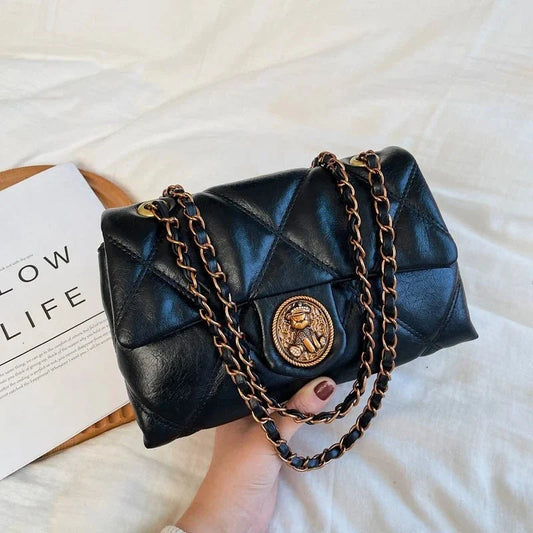 Women's luxury Lingge pattern pure leather handbag by TrendLux Wear, featuring a stylish design and elegant craftsmanship.
