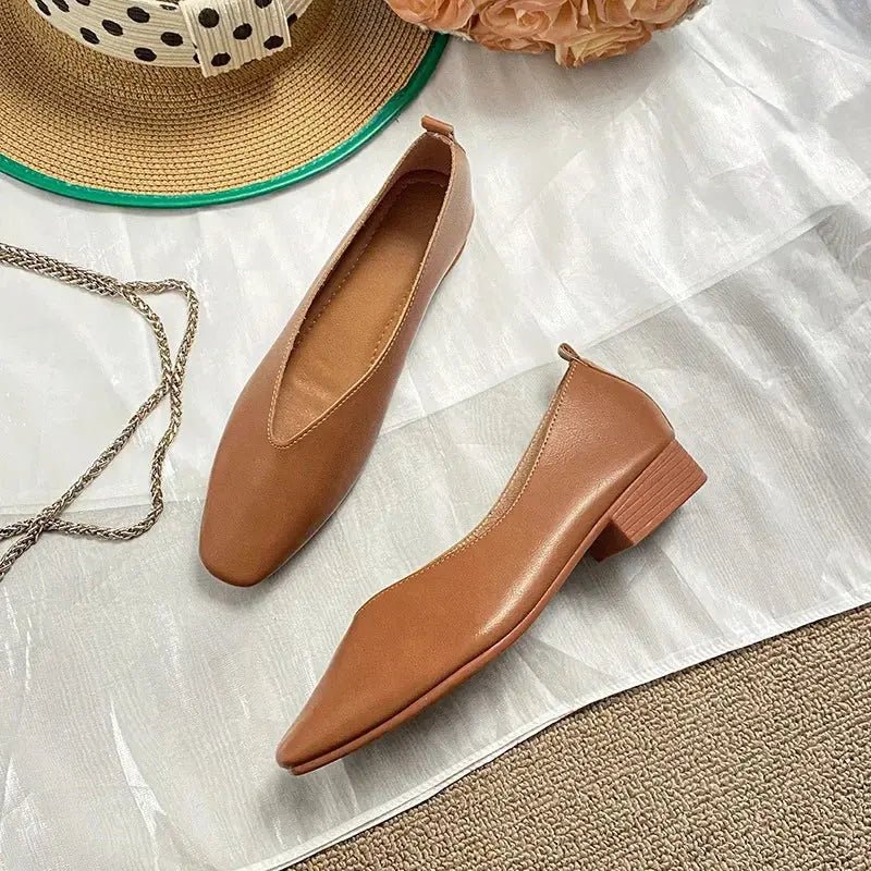 Women's round-toe leather loafer flats by TrendLux Wear, featuring classic design and comfortable slip-on style.
