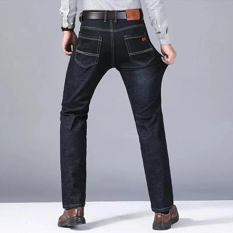 Men's slim fit black biker jeans by TrendLux Wear, classic straight-leg style in size 30 to 38, shown in dark denim with stitching details.