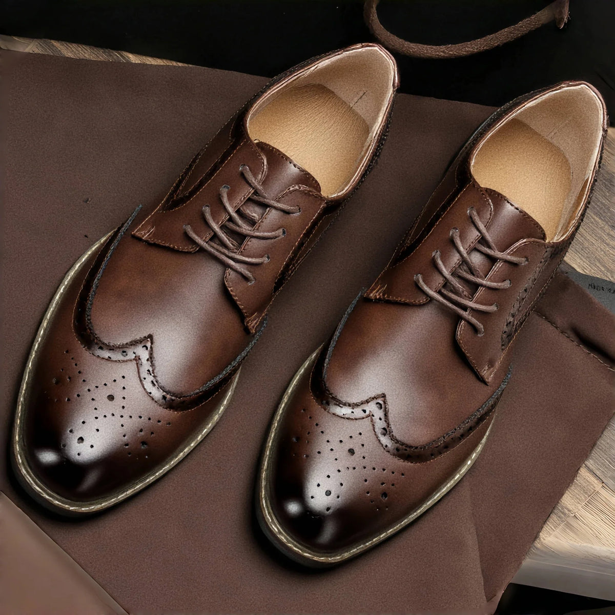 Men's black and brown leather lace-up brogue dress shoes by TrendLux Wear, formal business oxford shoes with detailed perforations.