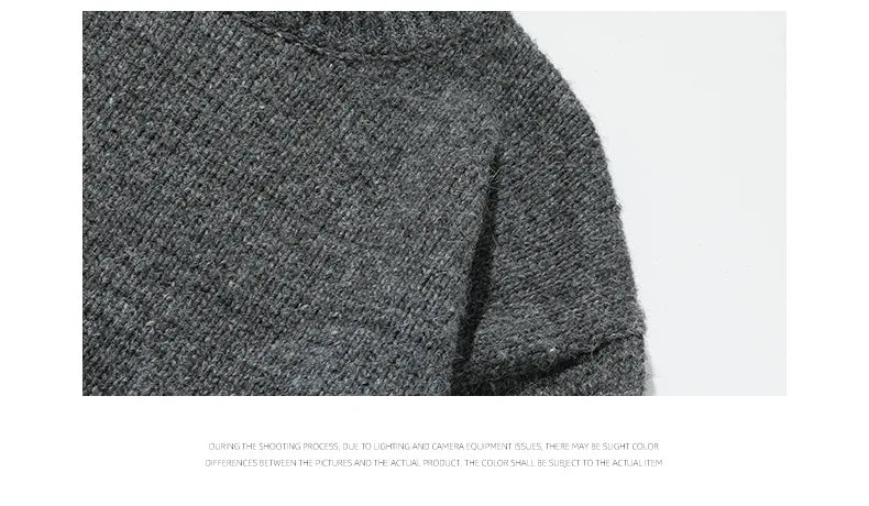 Men's oversized round neck sweater by TrendLux Wear in warm polyester knit, available in three colors.