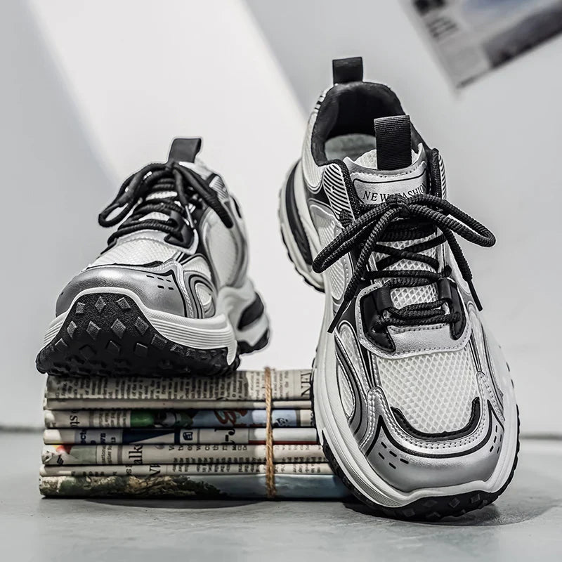 Men's chunky dad sneakers by TrendLux Wear with mesh and leather upper in beige, gray, and silver, showcasing stylish sneaker design.