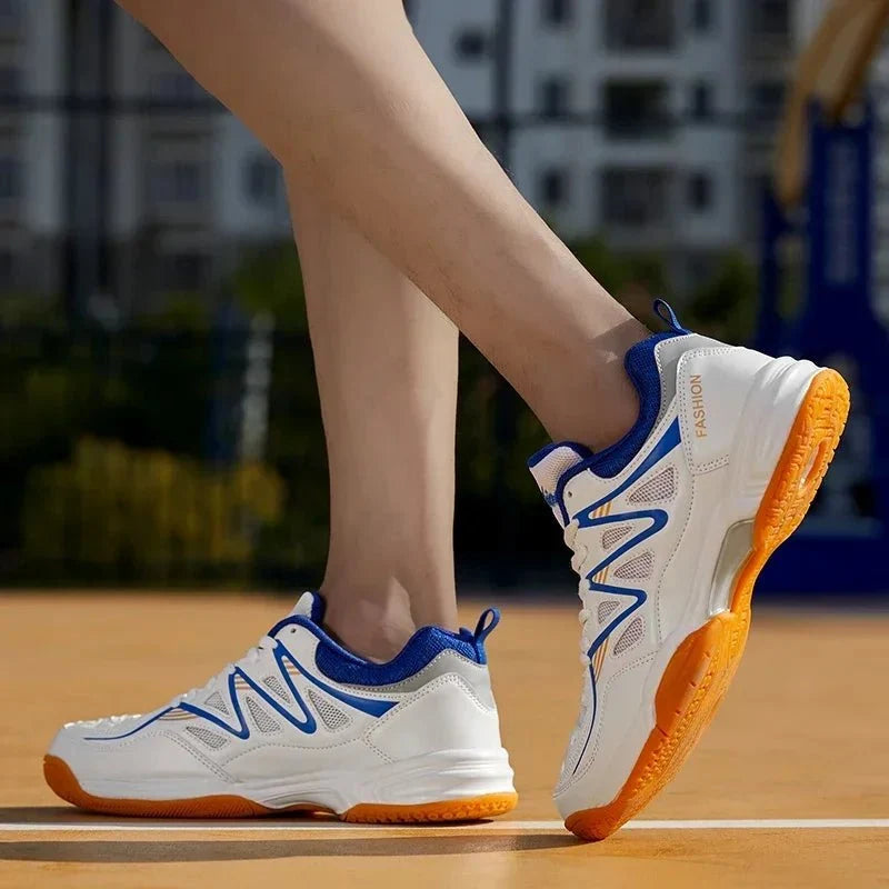 Unisex TrendLux Wear breathable court sneakers for tennis and volleyball, available in sizes 35 to 50, shown in black and white.