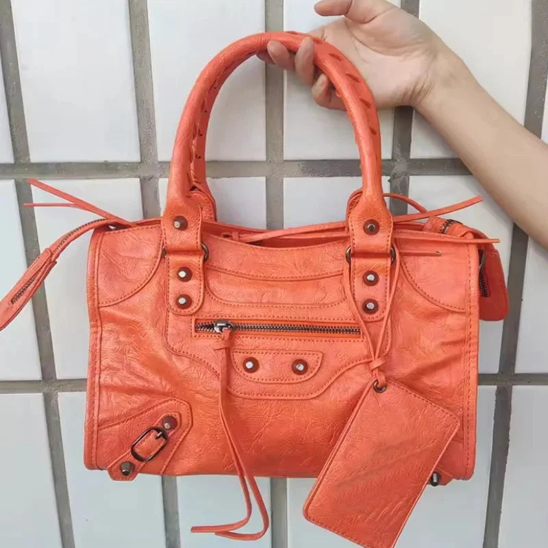Women's luxury motorcycle hobo handbag by TrendLux Wear, high-capacity leather bag with stylish design and spacious interior.