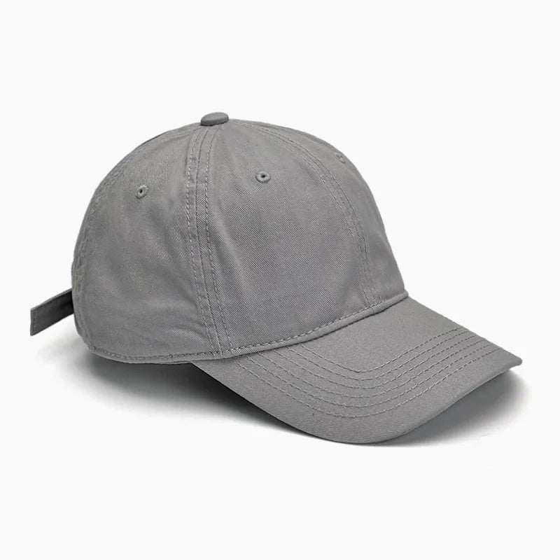 Unisex soft-top dad hat by TrendLux Wear featuring sun protection, plain baseball cap style in multiple colors.