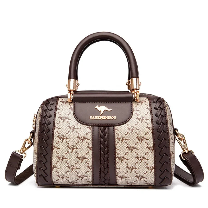 Brown and cream designer shoulder bag featuring animal prints and a woven texture, with a detachable strap and gold hardware.