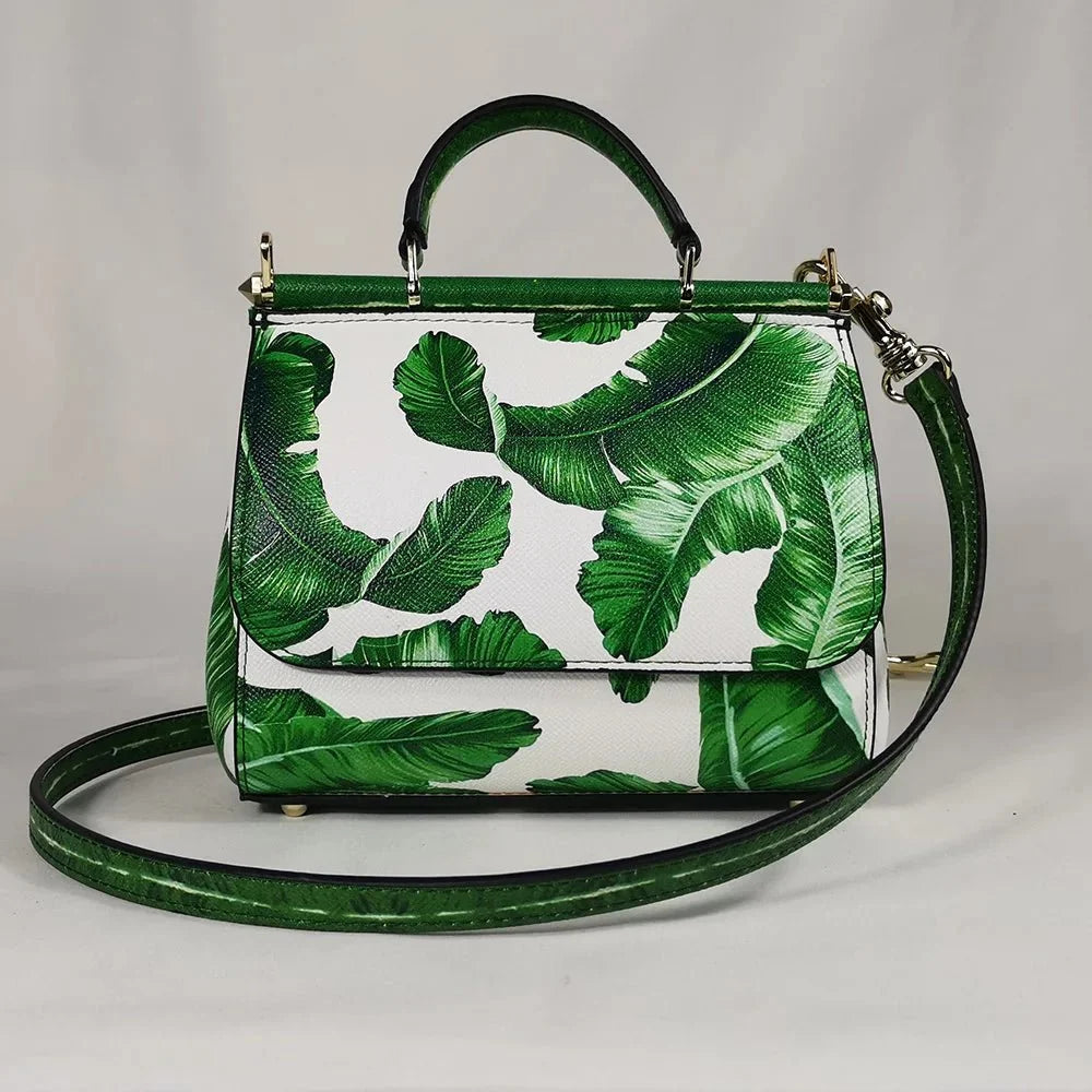 Women’s rose PU leather crossbody tote handbag with shoulder strap and spacious interior by TrendLux Wear