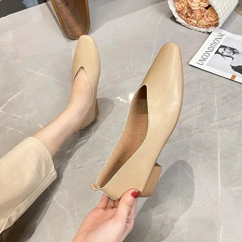 Women's round-toe leather loafer flats by TrendLux Wear, showcasing stylish, comfortable shoes with smooth leather finish.