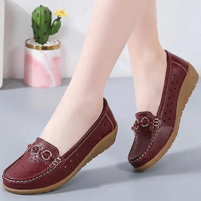 Women's breathable hollow wedge loafer pumps by TrendLux Wear, featuring stylish design and comfortable slip-on shoes.