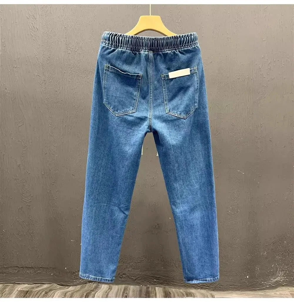 Men's vintage loose straight-leg jeans by TrendLux Wear made of durable cotton denim, perfect for casual spring and autumn wear.