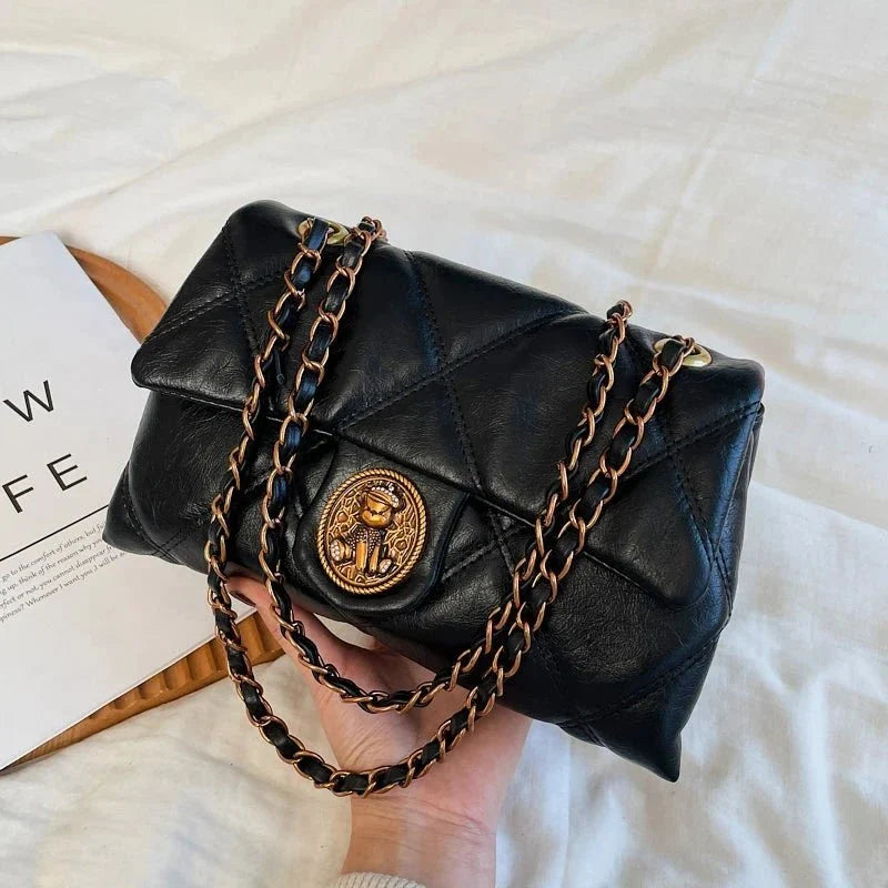 Women's luxury lingué pattern pure leather handbag by TrendLux Wear, featuring a stylish designer handbag with intricate leather detailing.