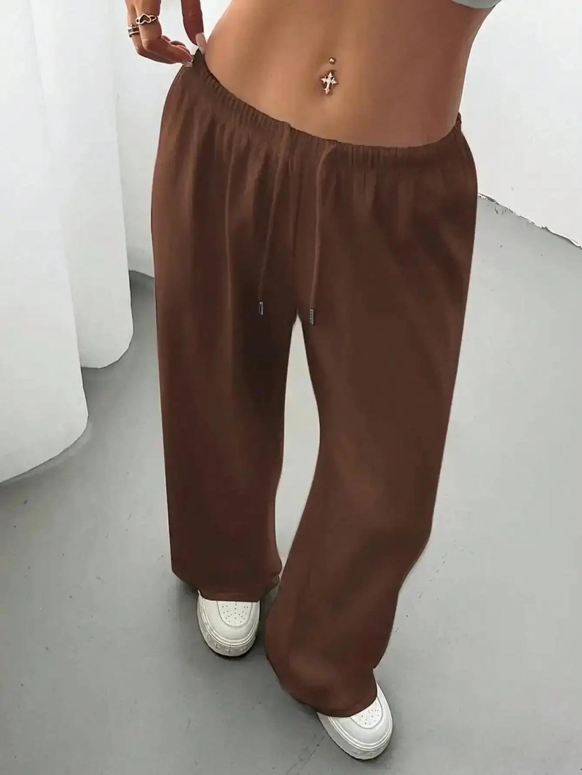 Light beige ladies' casual wide-leg jogging pants by TrendLux Wear, featuring a relaxed fit and comfortable waistband.