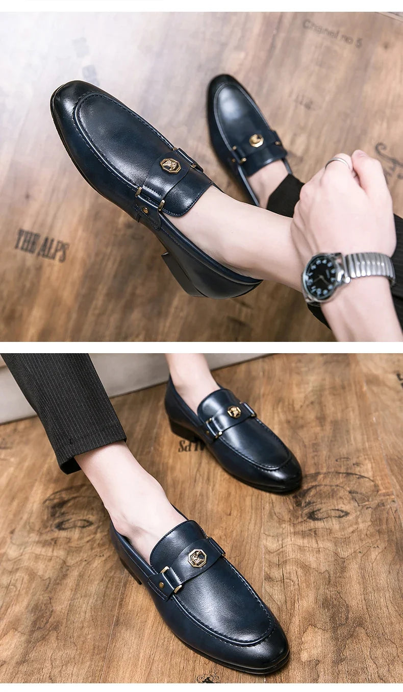 Men's slip-on dress loafers in dark blue leather, featuring a round toe and gold metal buckle detail.