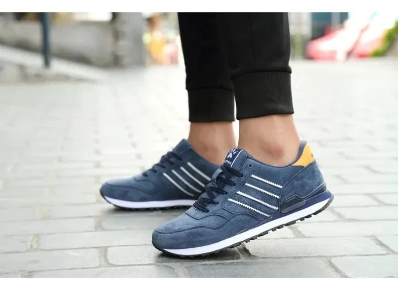 Men's luxury suede running sneakers by TrendLux Wear featuring breathable, anti-odor sport shoes with sleek design and comfortable fit.