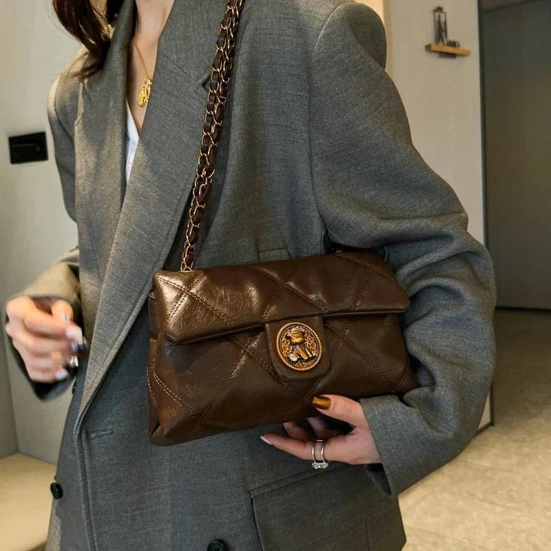 Women's luxury leather handbag with Lingge pattern by TrendLux Wear, showcasing elegant design and high-quality craftsmanship.