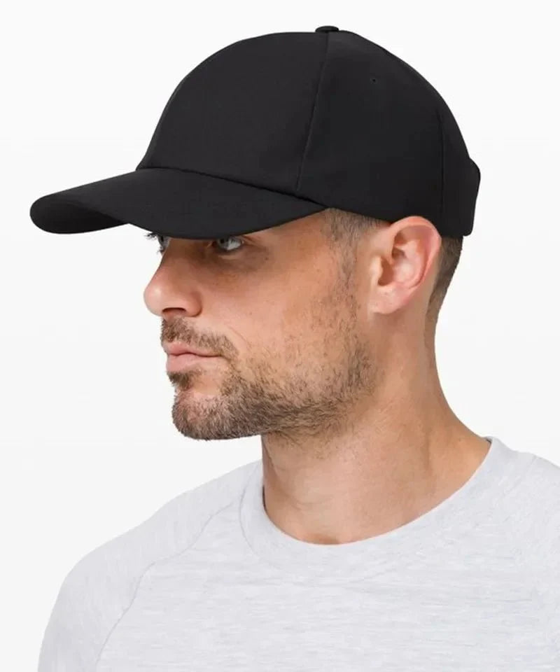 Unisex plain baseball cap by TrendLux Wear, adjustable structured hat in various colors, shown in a neutral view.