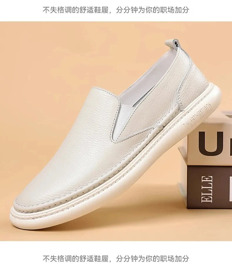 Men's genuine leather casual loafers by TrendLux Wear, breathable slip-on flat shoes in solid color with a sleek, stylish design.