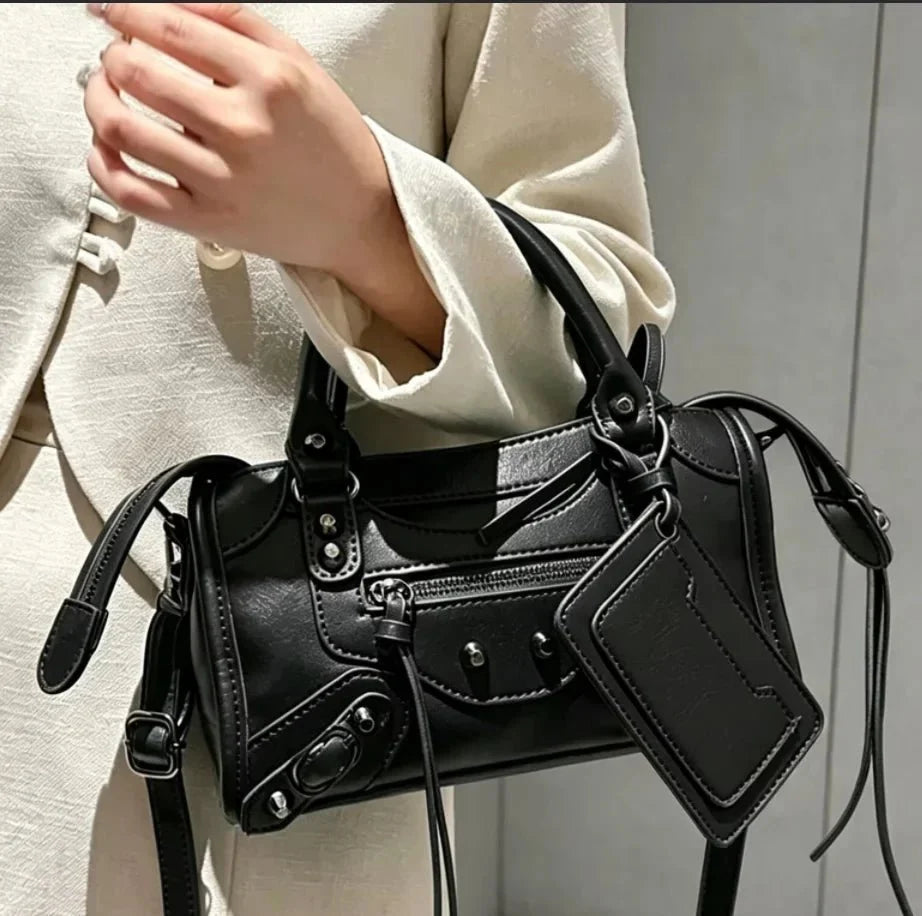 Luxury women's motorcycle hobo handbag by TrendLux Wear, high-capacity leather bag with stylish design and multiple compartments.