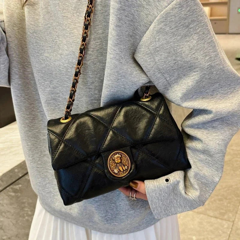 Women's luxury TrendLux Wear leather handbag with lingge pattern, featuring elegant design and high-quality pure leather.