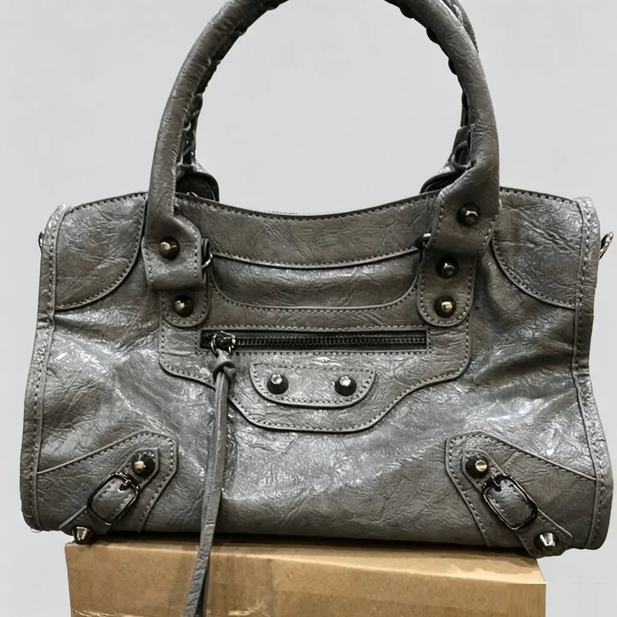 Women's luxury motorcycle hobo handbag by TrendLux Wear, high-capacity leather bag with stylish design and spacious interior.