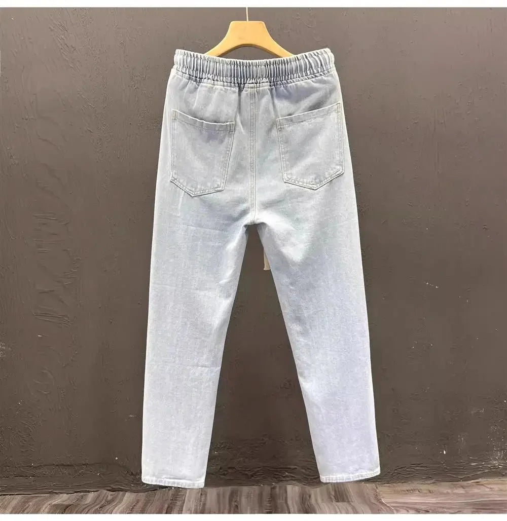 Men's vintage loose straight leg jeans by TrendLux Wear made of durable cotton denim, perfect for casual spring and autumn wear.
