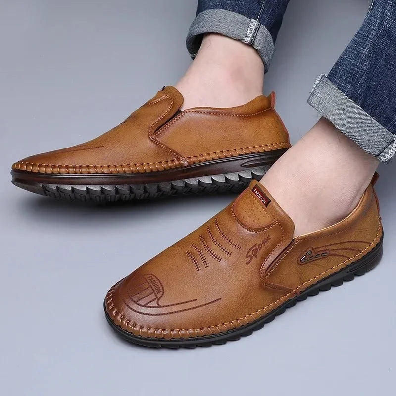Men's handmade PU leather moccasin sneakers by TrendLux Wear, featuring a soft sole, breathable design, and casual business style.
