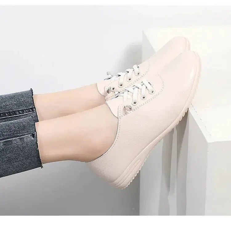 Women's lace-up leather loafers by TrendLux Wear, stylish shoes with a sleek design, perfect for casual or office wear.