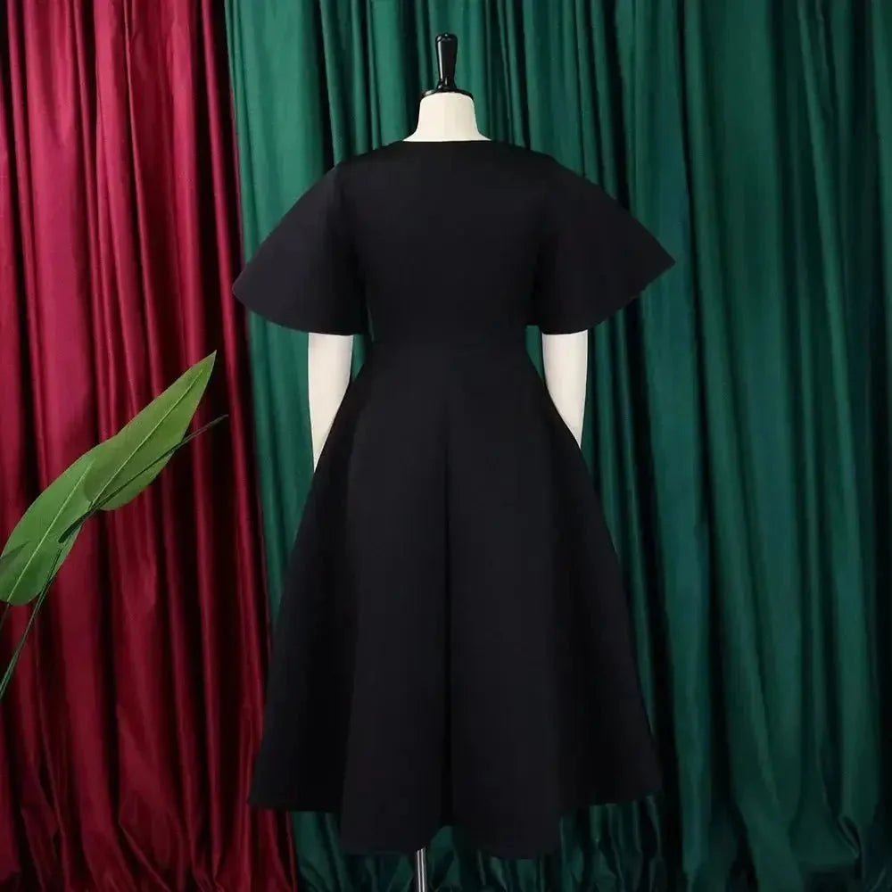 Women's polyester high waist flare sleeve pleated A-line midi dress by The Glow Sanctuary, shown in a stylish, flowy silhouette.