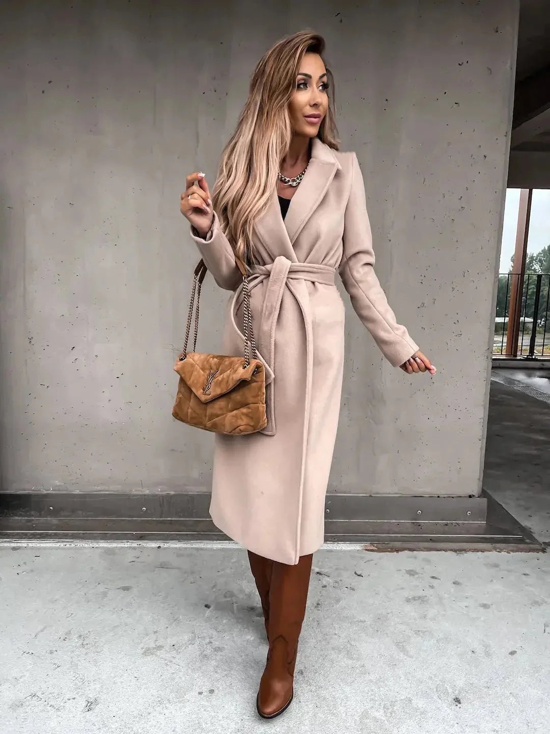 Women's solid woolen lapel coat from TrendLux Wear, featuring classic design and tailored fit, perfect for cold weather outerwear.