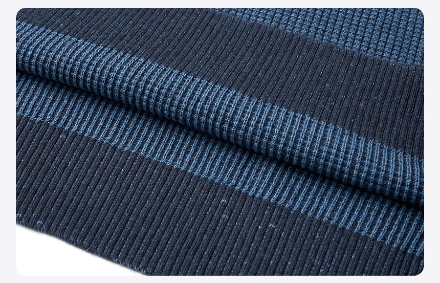 Men's oversized waffle-knit crewneck sweater in Heather Denim Blue by TrendLux Wear, featuring a casual pullover design.
