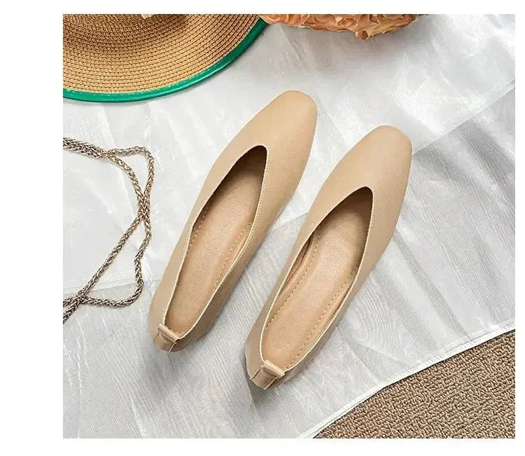 Women's round-toe leather loafer flats by TrendLux Wear, showcasing stylish and comfortable slip-on shoes in black leather.