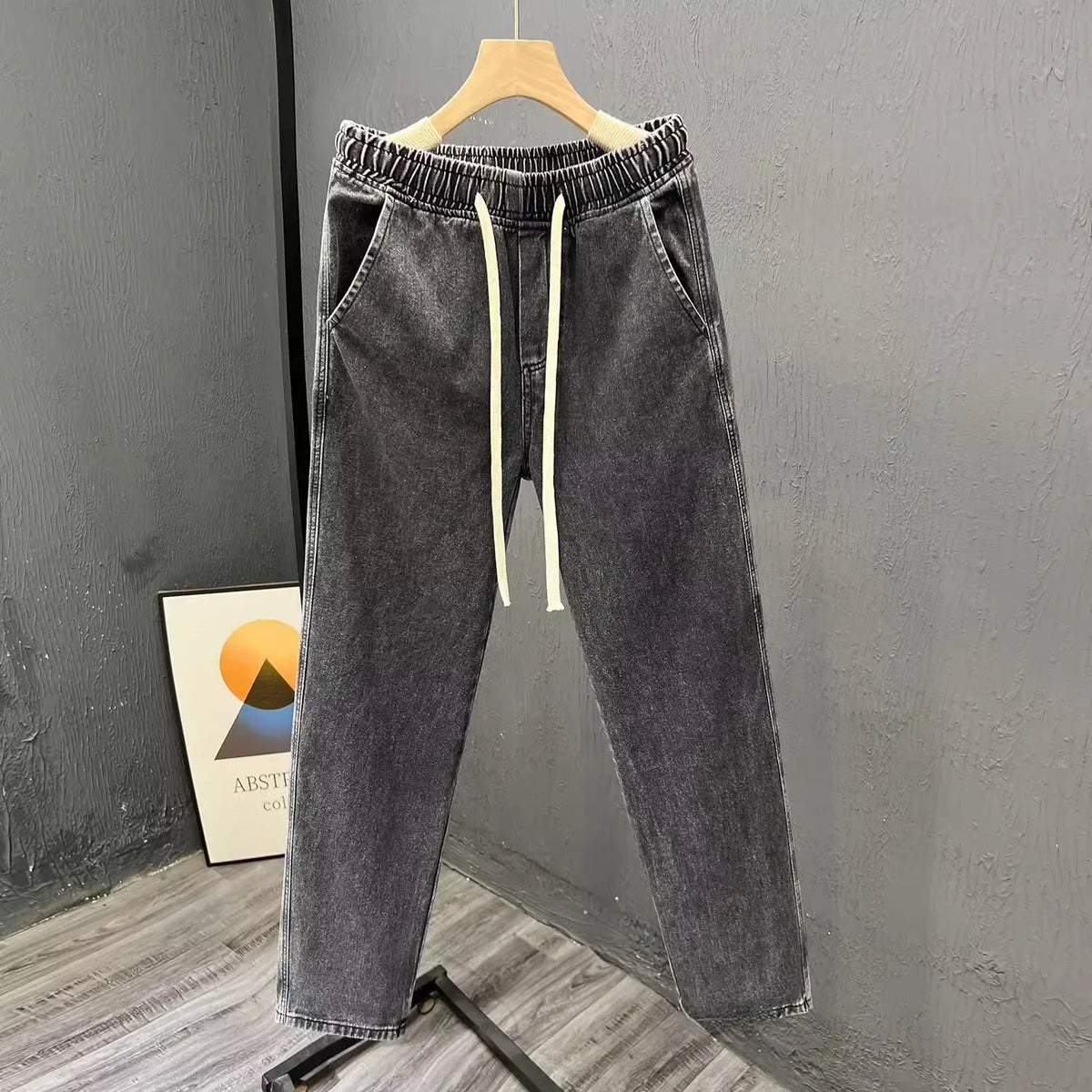 Men's vintage loose straight leg jeans by TrendLux Wear, durable cotton denim, styled for casual spring and autumn wear.