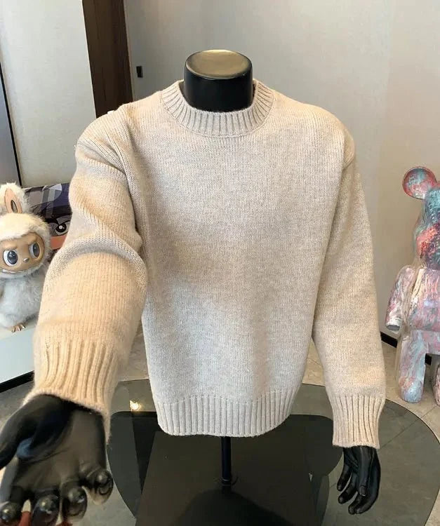Men's cashmere-blend round neck pullover sweater by TrendLux Wear in multiple colors, shown in a close-up of the cozy knit fabric.