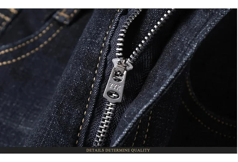 Men's black slim fit biker jeans by TrendLux Wear with straight leg style, shown in size 32 on a model.