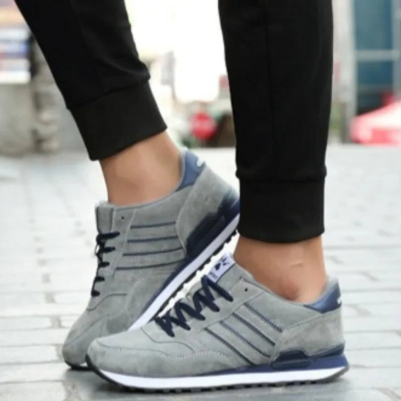 Men's luxury suede running sneakers by TrendLux Wear featuring breathable, anti-odor sport shoes with sleek design.