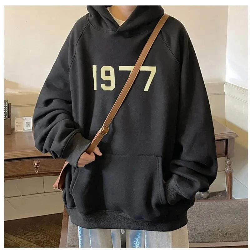 Men's TrendLux Wear 1977 printed Harajuku hoodie with loose fit long sleeves and graphic design, available in size M to 5XL.