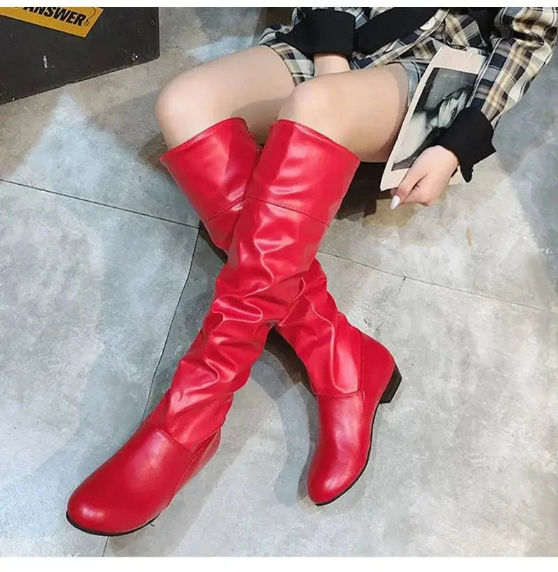 Women's pleated lace-up knee-high boots by TrendLux Wear, showcasing stylish design and textured fabric details.