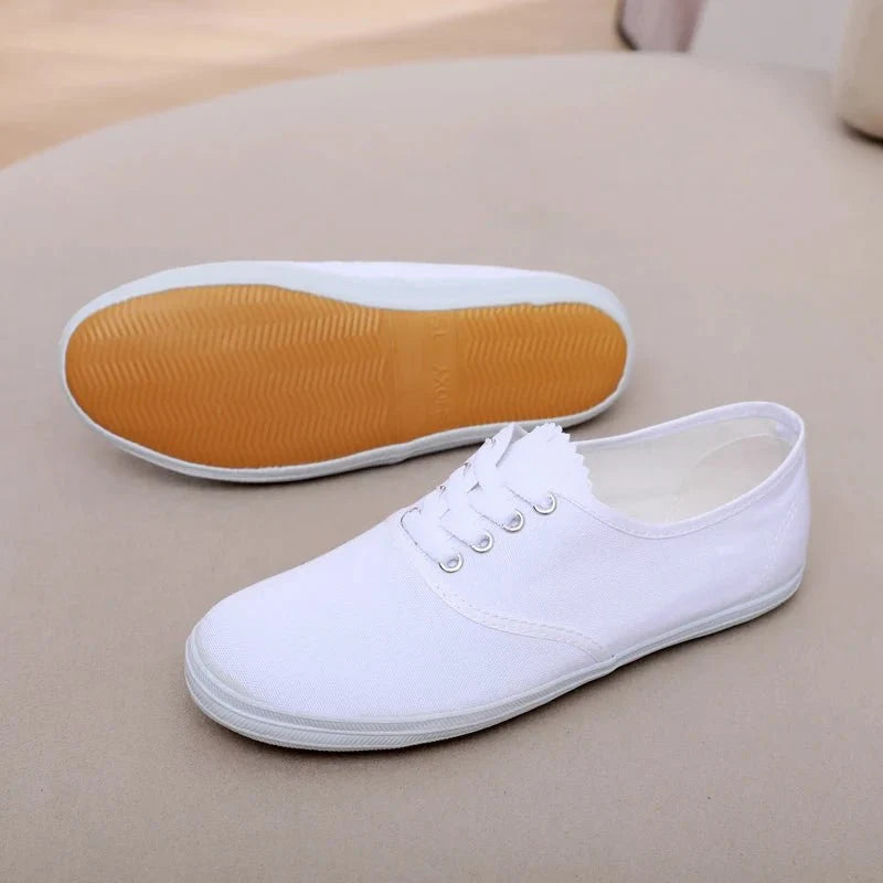 TrendLux Wear professional table tennis shoes with breathable fabric and anti-slip soles for training and competition.
