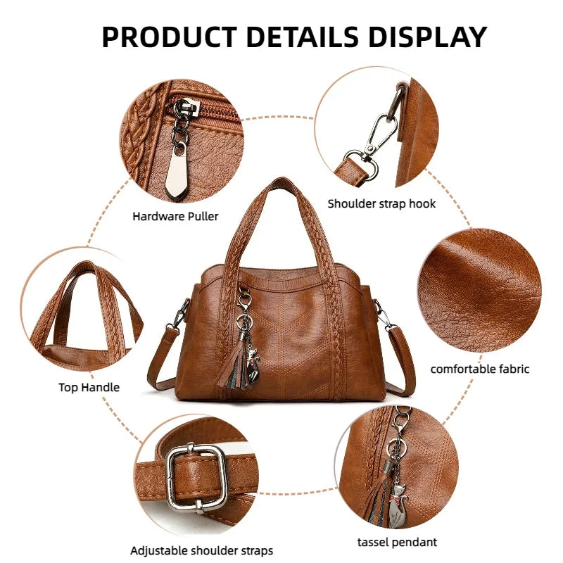 Brown leather shoulder bag with two top handles and adjustable straps, featuring a zipper closure and tassel pendant.