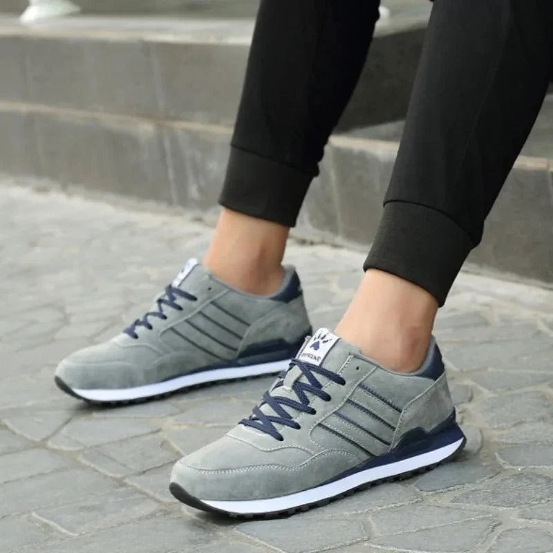 Men's luxury suede running sneakers by TrendLux Wear featuring breathable, anti-odor sport shoes with a sleek design.