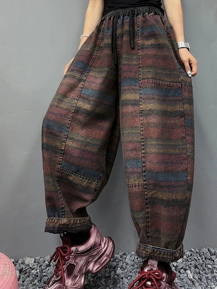 Women's Korean style striped harem jeans with loose elastic waist from TrendLux Wear, featuring relaxed denim trousers in a stylish design.
