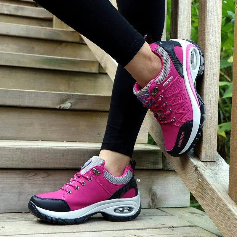 Women's breathable PU-EVA platform lace-up sneakers by TrendLux Wear, showing stylish white sneakers with chunky soles and laces.