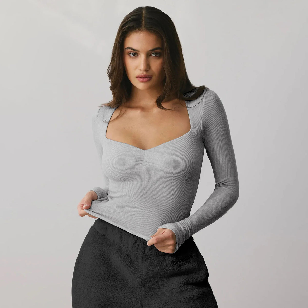 Women’s Y2K square neck long-sleeve top by TrendLux Wear, slim fit viscose blend t-shirt, perfect for fall and winter.