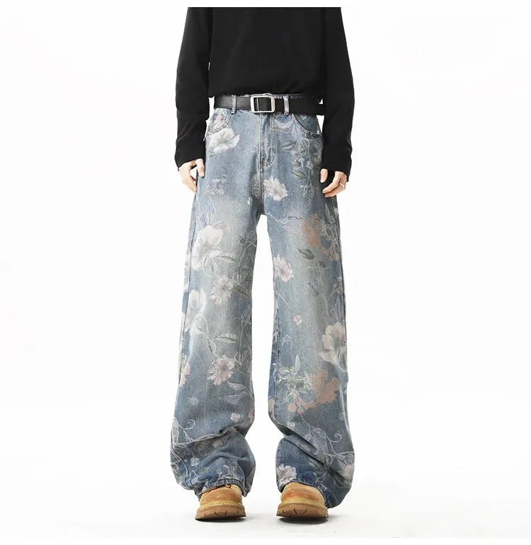 Men's retro floral print jeans from TrendLux Wear featuring loose wide-leg denim and casual hip-hop style.