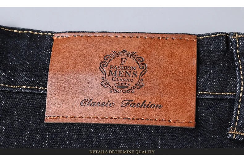 Men's slim fit black biker jeans by TrendLux Wear, straight leg design, showing front view with belt loops and classic denim texture.