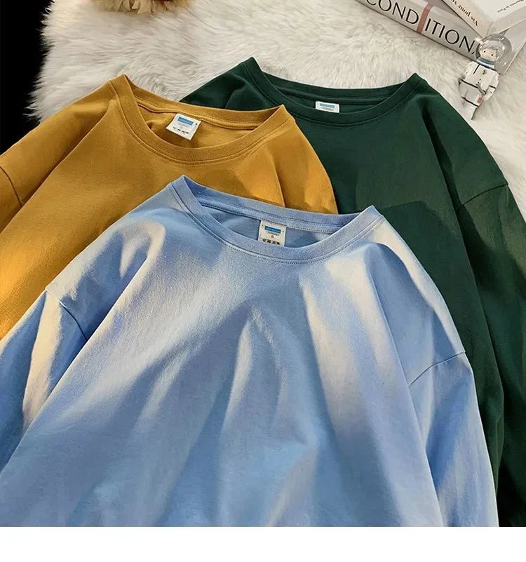 Unisex oversized long sleeve blank T-shirt by My Store 5, shown in size S, with a relaxed fit and available in 18 colors.