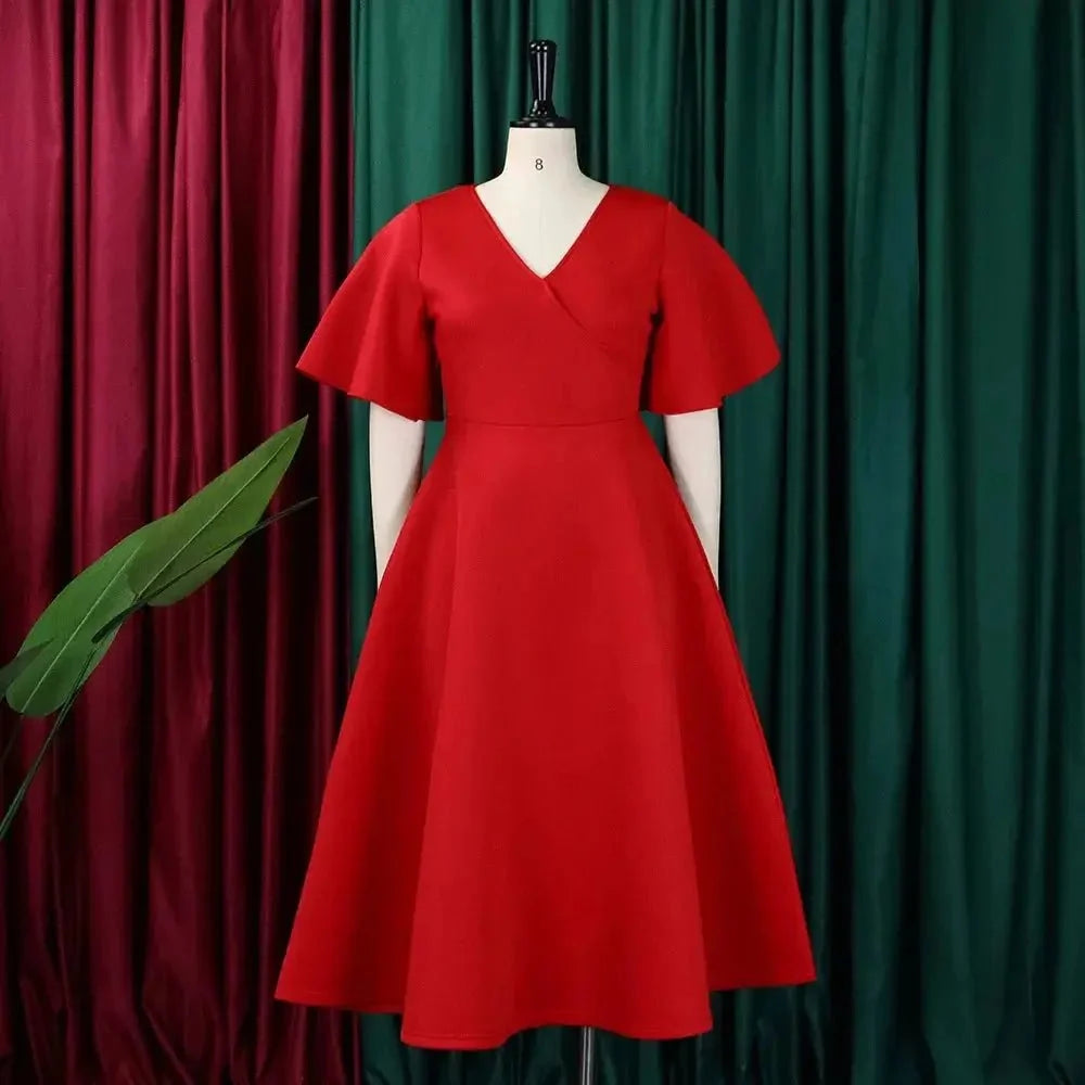 Women's polyester high waist flare sleeve pleated A-line midi dress by The Glow Sanctuary, shown in a stylish full-length view.