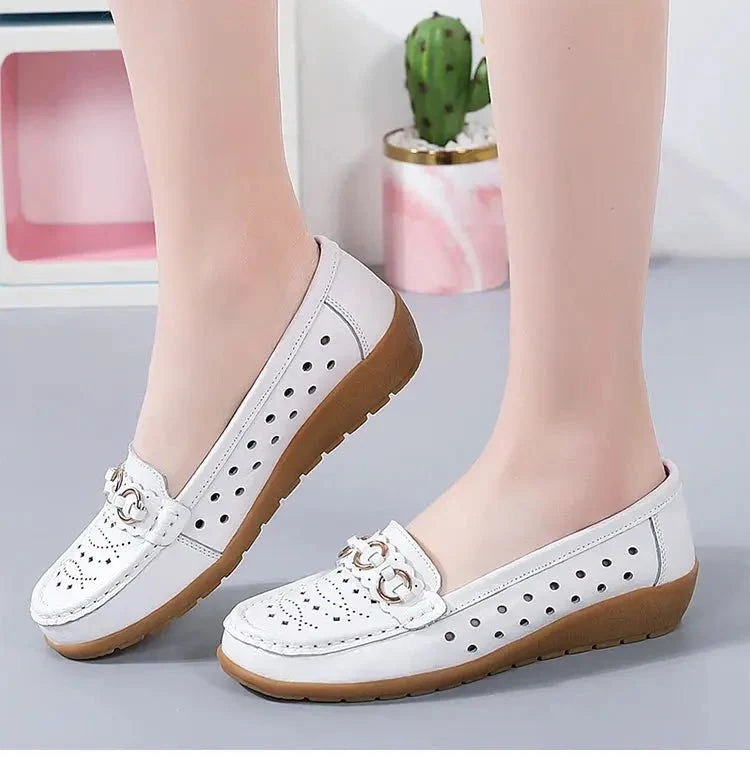 Women's breathable hollow wedge loafer pumps by TrendLux Wear, featuring stylish design and comfortable slip-on shoes.