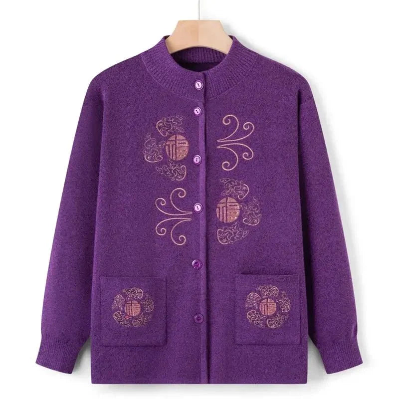 Women's vintage printed knit cardigan coat by TrendLux Wear, featuring colorful patterns and cozy knit fabric.