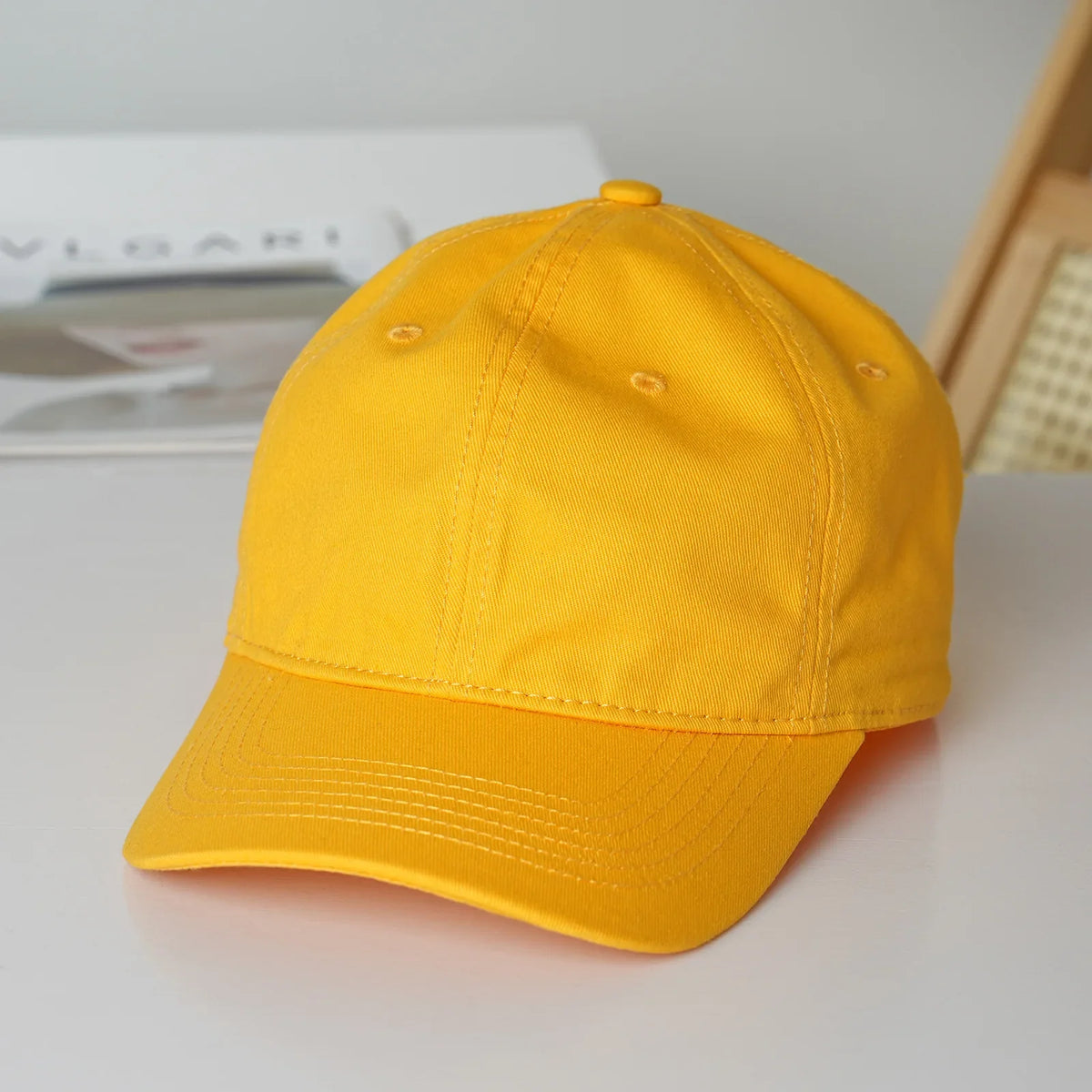 Unisex soft-top dad hat by TrendLux Wear in plain style with sun protection, available in 21 colors, shown in black.